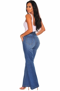 Rear view of high-waisted flared jeans showing the push-up effect and denim texture