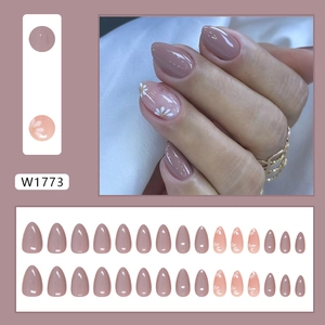 Autumn almond press-on nails set featuring nude cinnamon pink with daisy floral art