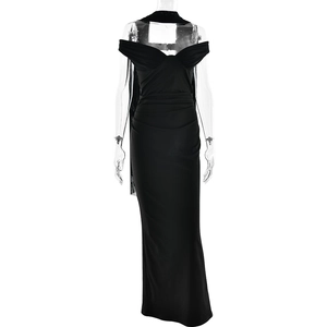 Detail of elegant black off-shoulder mesh dress with flattering bodycon fit and drape