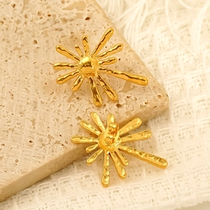 Exaggerated 18K gold sunburst stud earrings in stainless steel with textured finish