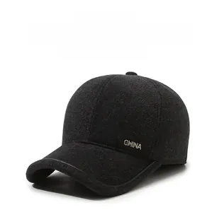 Close-up of winter wool baseball cap featuring ear flaps and metal CHINA letter detail