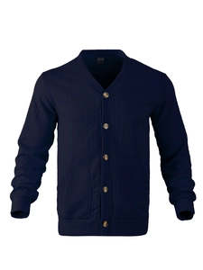 Detailed macro view of the jacquard knit texture and metallic buttons on a navy cardigan