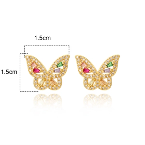 Detail of gold butterfly studs with colorful cubic zirconia and 1.5cm size markings