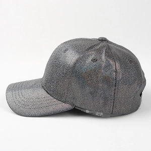 Side view of metallic silver baseball cap with shimmering sequins and curved brim