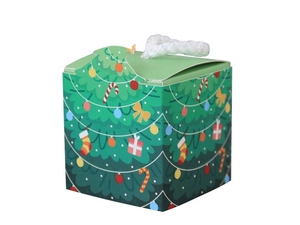 Detail view of a 5.5cm square green Christmas gift box with white handle and festive motifs