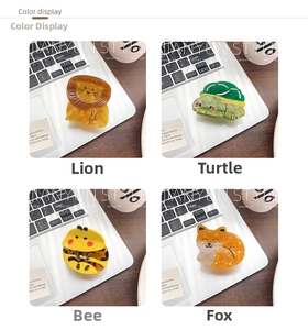 Detail display of cartoon animal hair claws including lion, turtle, bee and fox designs