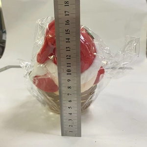 Detailed measurement of plush strawberry candy basket showing 16cm height with ruler