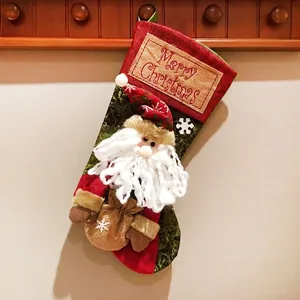 Classic red Christmas stocking featuring a 3D Santa Claus and Merry Christmas embroidery