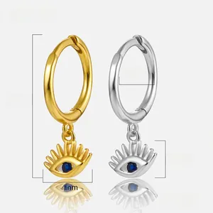 Detailed view of Evil Eye hoop earrings in gold and silver finish with blue zircon stone