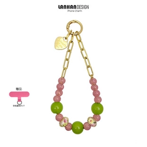 Pink and green beaded phone strap with a heart pendant and a golden lobster clasp
