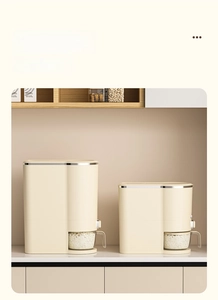 Modern cream-colored rice storage containers in two sizes with clear measuring cups