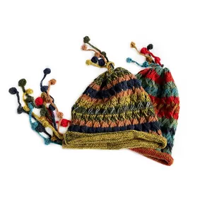 Bohemian striped knit beanies with colorful tassel earflaps and vintage ethnic style