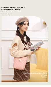 Pink quilted bucket bag with gold lock shown with a casual knit sweater and skirt