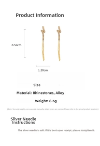 Detail showing dimension and materials of geometric tassel earrings with rhinestones