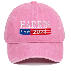 Detailed view of pink washed cotton baseball cap with Harris 2024 embroidery