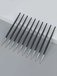 Set of 12 precise eyeliner and nail art brushes with fine orange bristles and black handles