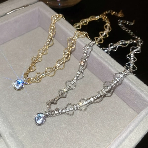 Elegant gold and silver wave chain necklaces with brilliant round zircon pendants