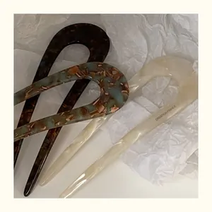 Three-piece acetate U-shaped hairpins set in tortoiseshell, green marble, and cream white