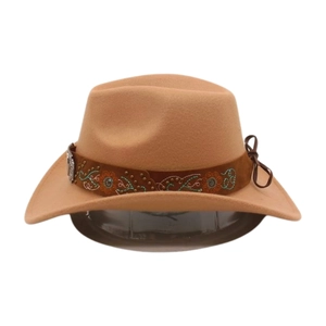 Detail of camel wool felt cowboy hat featuring ethnic embroidery and leather bow trim