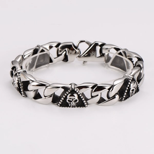 Detail view of punk style skeleton triangle links and steel curb chain bracelet