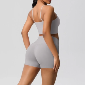 Close-up of seamless light grey two-piece yoga set showing back details and fabric texture