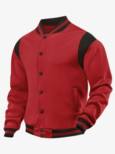 Detail of red and black baseball jacket showing ribbed collar and metal snap buttons