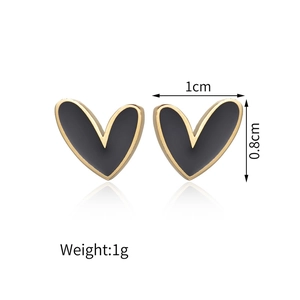 Asymmetric heart stud earrings in black enamel and gold-plated stainless steel