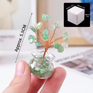 Miniature green crystal money tree in glass jar, handcrafted with wire and gemstones