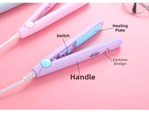 Detail of mini hair straightener with ceramic coating plates and cartoon chicken pattern