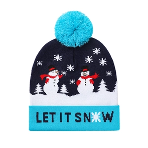 Bonnet de Noël en tricot avec pompon bleu et motif bonhomme de neige Let It Snow