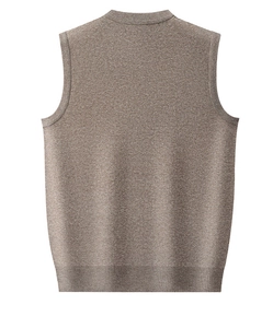 Detail view of the ribbed hem and back structure of a knitted men's wool vest