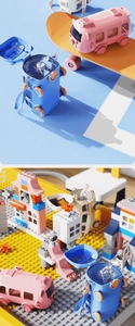 Creative bus-shaped kids water bottle detail with rolling wheels and adjustable strap