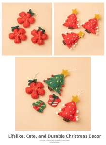 Detail showing wool felt Christmas ornaments with embroidery and white pom-poms