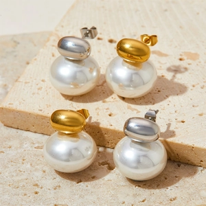 French vintage style pearl stud earrings in gold and silver finish on stone base