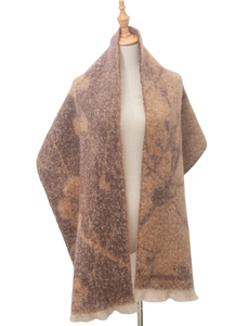 Detail of jacquard floral scarf with short tassels in brown and camel wool blend texture