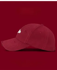 Detailed close-up of distressed cotton baseball cap featuring white 3D embroidery detail