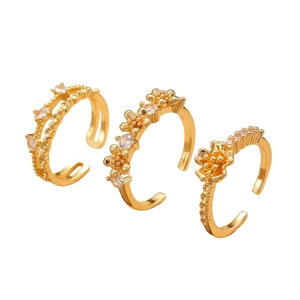Three-piece set of elegant gold adjustable rings with flower design and zircon inlay