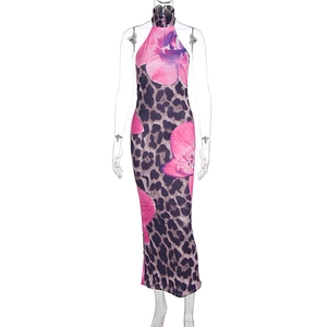 Detail of sexy leopard print halter neck bodycon dress with purple floral patterns