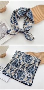 Detail of navy damask cotton linen scarf with elegant black lace edges and floral patterns