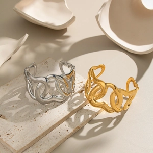 Elegant gold and silver stainless steel open bangles with hollow heart chain design