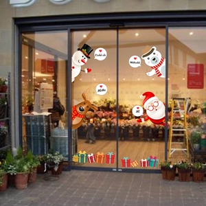 Stickers de Noël pour vitrines avec Père Noël, renne et bonhomme de neige festifs