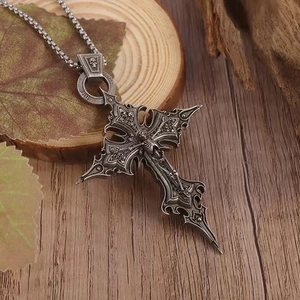Macro shot of gothic silver cross skull pendant featuring the 925 silver hallmark on ring