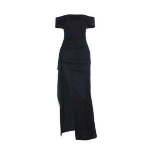 Detail of off-shoulder black dress featuring shimmering fabric and side high slit