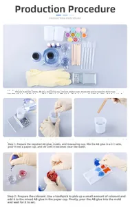 Resin art kit with 3:1 ratio AB glue, silicone molds, glitter and tools on white table