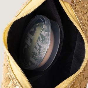 Draufsicht auf offene PU-Lederhandtasche mit schwarzem Futter und goldenem Reißverschluss