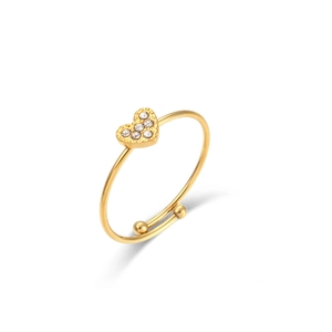 Detail of adjustable gold ring with sparkling heart-shaped zircon and smooth round beads