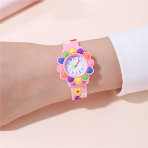 Pink cartoon watch for girls with silicone strap and colorful flower petal dial design