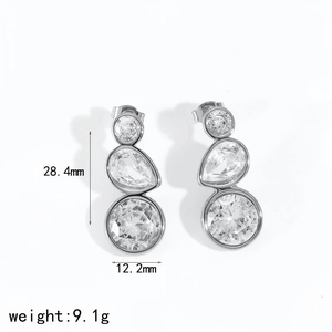 Detail view of 28.4mm drop earrings featuring three graduated cubic zirconia stones
