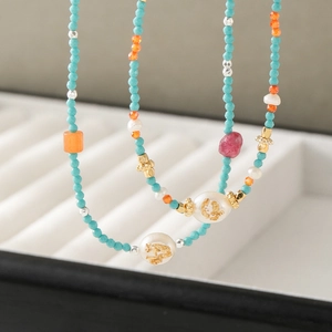 Bohemian freshwater pearl and colorful natural stone beaded necklace with gold metal accents