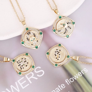 Rotating 18K gold plated leopard head necklace with green zircon inlays for stress relief